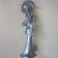 Statuina di Donna in Metallo con Scollatura Vestito Lungo Cappello Falda Larga e Sciarpa Vintage